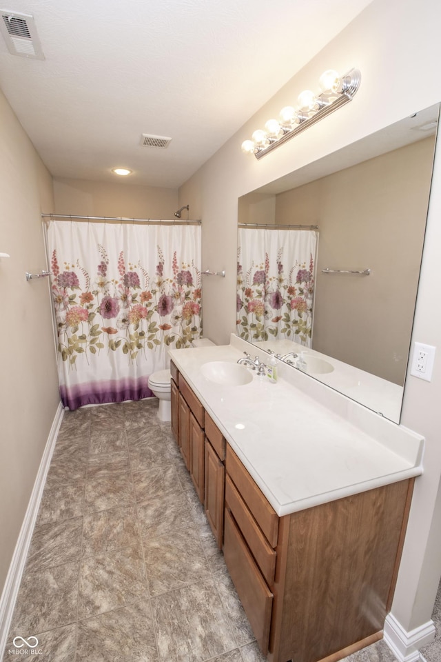 6448 W Whiteside Ct, Greenfield, IN 46140 - full bathroom featuring vanity and toilet