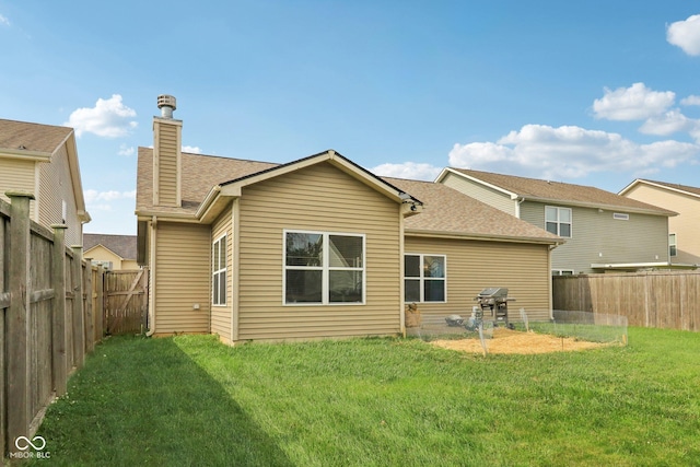 958 Denton Ct, Westfield, IN 46074 - rear view of property featuring a chimney, a fenced backyard, and a shingled roof