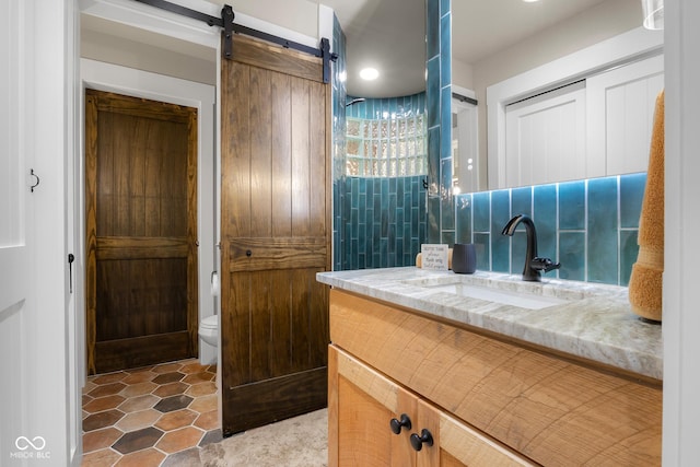 2350 E County Road 20 N, North Vernon, IN 47265 - bathroom with vanity, decorative backsplash, and tile patterned flooring