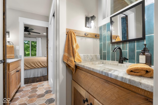 2350 E County Road 20 N, North Vernon, IN 47265 - bathroom with vanity, a ceiling fan, ensuite bath, and tile patterned floors