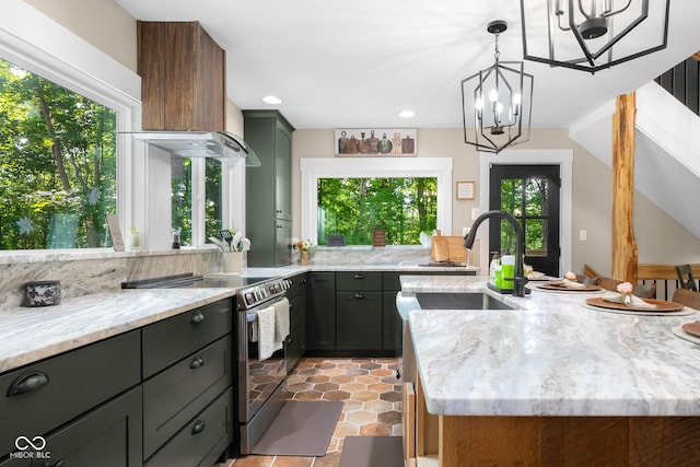 2350 E County Road 20 N, North Vernon, IN 47265 - kitchen featuring stainless steel range with electric stovetop, plenty of natural light, wall chimney exhaust hood, light stone counters, and recessed lighting