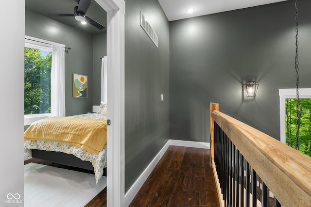 2350 E County Road 20 N, North Vernon, IN 47265 - hallway with dark wood finished floors, plenty of natural light, and an upstairs landing