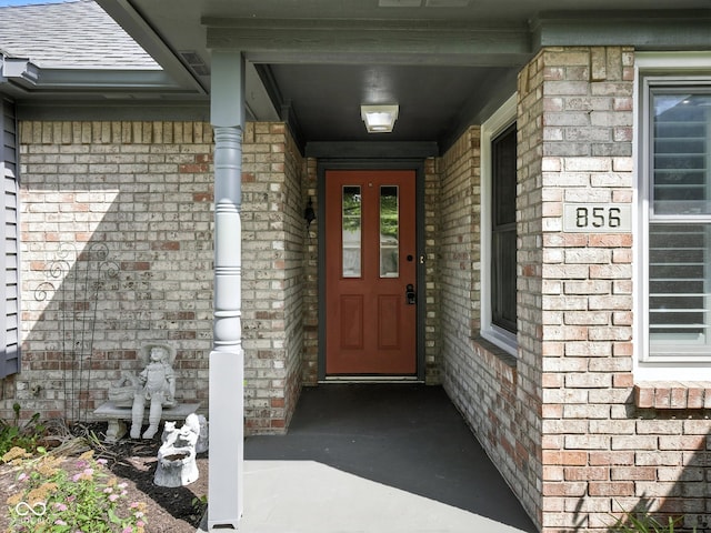 856 Cypress N, Greenwood, IN 46143 - property entrance featuring brick siding and covered porch