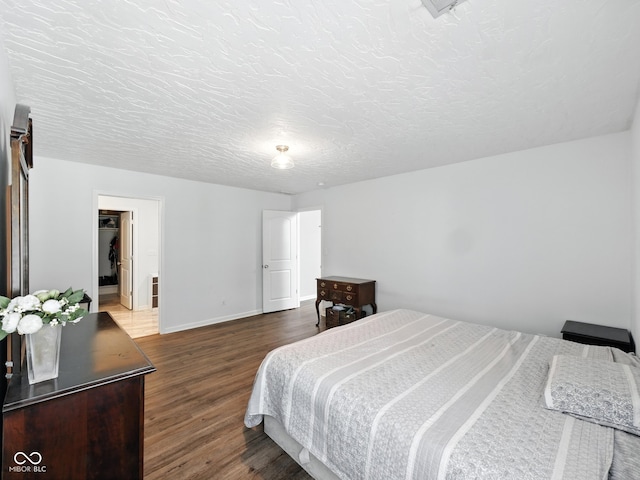 856 Cypress N, Greenwood, IN 46143 - bedroom with wood finished floors and a textured ceiling