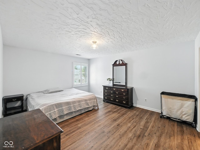 856 Cypress N, Greenwood, IN 46143 - bedroom with wood finished floors and a textured ceiling
