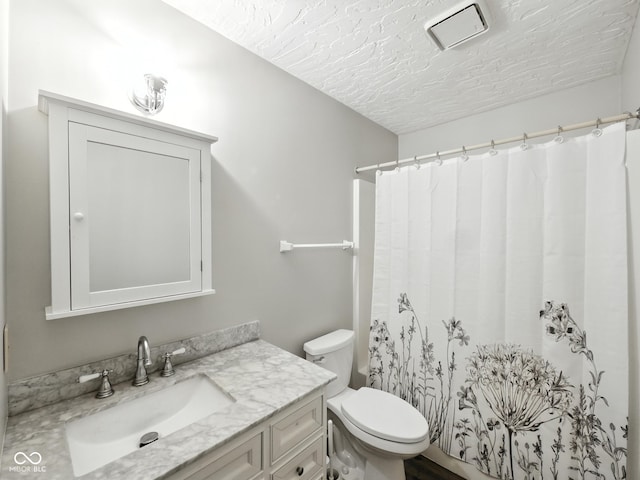 856 Cypress N, Greenwood, IN 46143 - bathroom with vanity, a textured ceiling, and a shower with curtain
