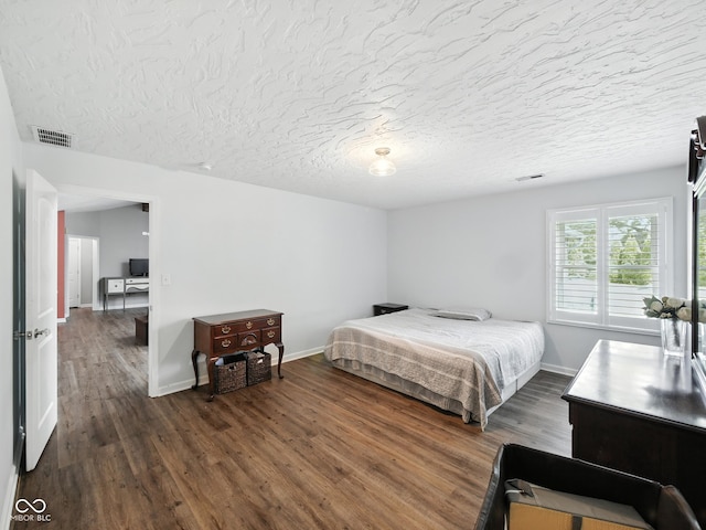 856 Cypress N, Greenwood, IN 46143 - bedroom with dark wood finished floors and a textured ceiling