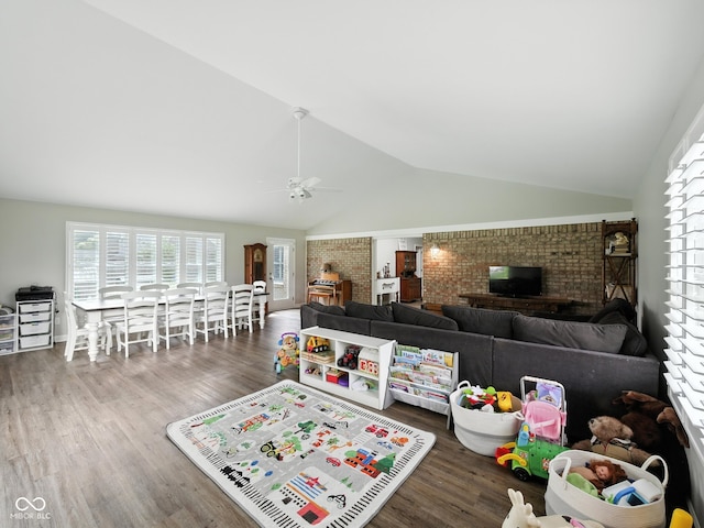 856 Cypress N, Greenwood, IN 46143 - living room with brick wall, lofted ceiling, wood finished floors, and ceiling fan