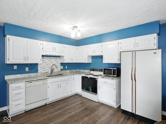 856 Cypress N, Greenwood, IN 46143 - kitchen with white appliances, white cabinetry, dark wood-style floors, and a textured ceiling