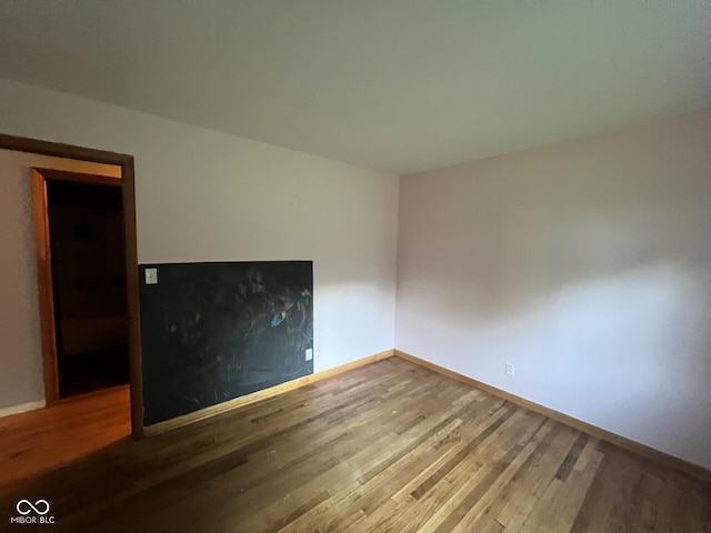 207 W Elm St, Spiceland, IN 47385 - spare room with wood finished floors