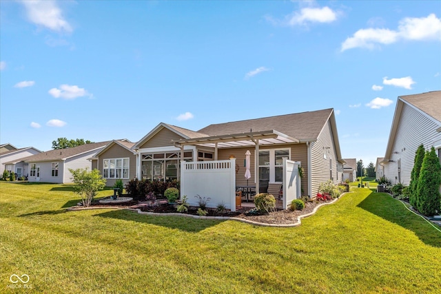 4905 Lilium Dr, Plainfield, IN 46168 - back of house with a pergola, a yard, a patio, and a sunroom