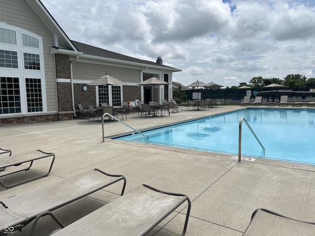 4905 Lilium Dr, Plainfield, IN 46168 - community pool featuring a patio