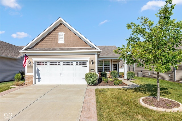 4905 Lilium Dr, Plainfield, IN 46168 - view of front of house with driveway, a front yard, and an attached garage