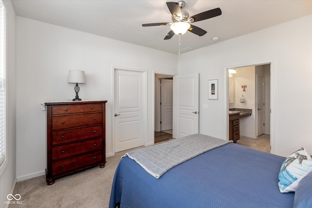 4905 Lilium Dr, Plainfield, IN 46168 - bedroom featuring light colored carpet, ensuite bathroom, and ceiling fan