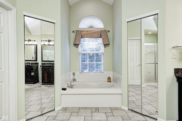 6813 Bluffgrove Dr, Indianapolis, IN 46278 - full bath with a bath, vanity, a stall shower, and high vaulted ceiling