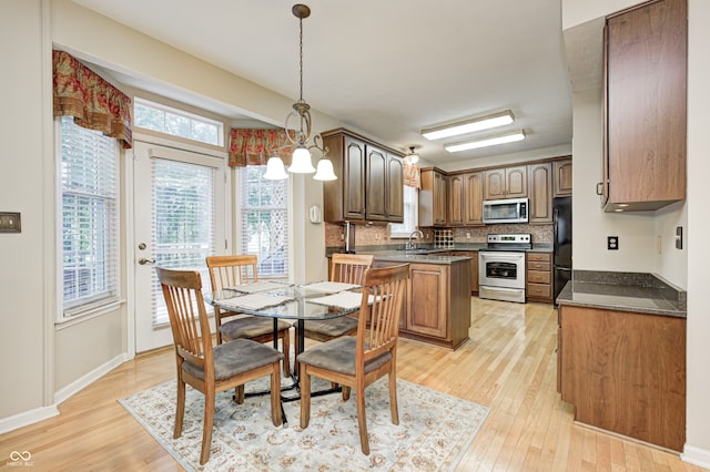 6813 Bluffgrove Dr, Indianapolis, IN 46278 - dining space featuring light wood-style floors