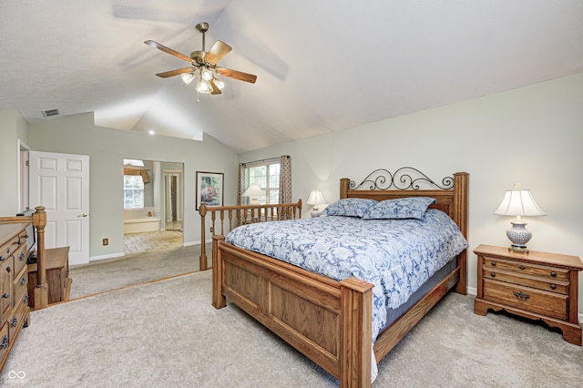 6813 Bluffgrove Dr, Indianapolis, IN 46278 - bedroom featuring light colored carpet, lofted ceiling, connected bathroom, and ceiling fan