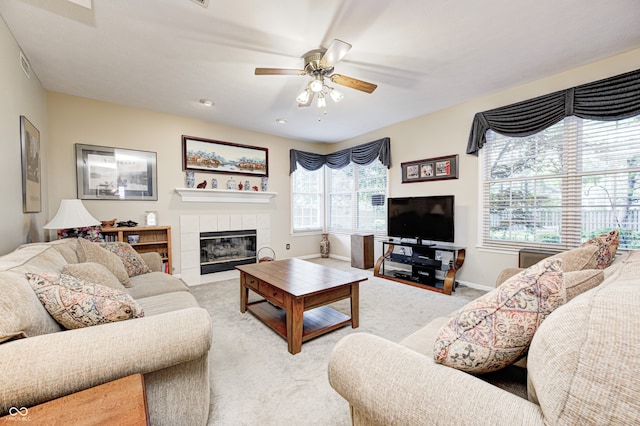 6813 Bluffgrove Dr, Indianapolis, IN 46278 - carpeted living room featuring ceiling fan and a fireplace