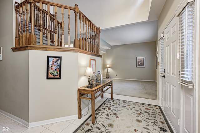 6813 Bluffgrove Dr, Indianapolis, IN 46278 - tiled entrance foyer with baseboards and carpet floors