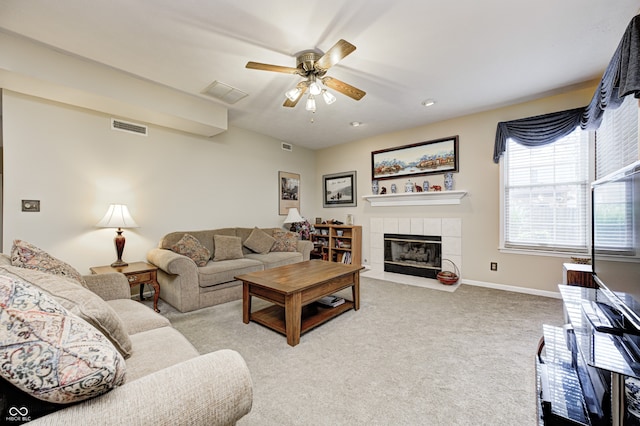 6813 Bluffgrove Dr, Indianapolis, IN 46278 - carpeted living area with ceiling fan and a tiled fireplace