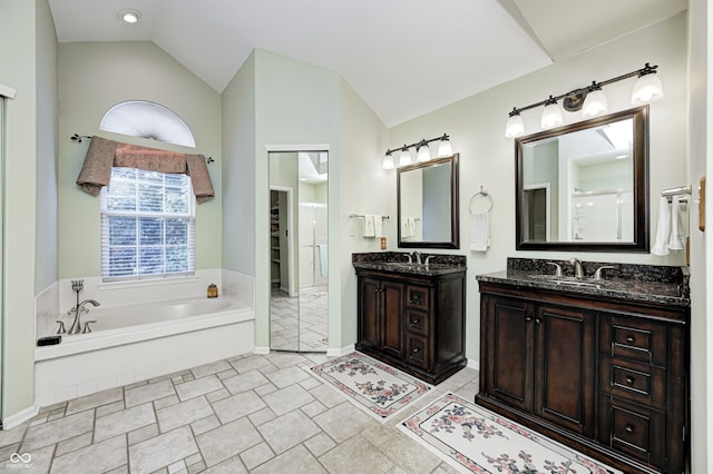 6813 Bluffgrove Dr, Indianapolis, IN 46278 - full bathroom featuring lofted ceiling, a garden tub, two vanities, and an enclosed shower