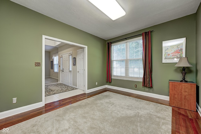 6813 Bluffgrove Dr, Indianapolis, IN 46278 - unfurnished room with plenty of natural light and wood finished floors