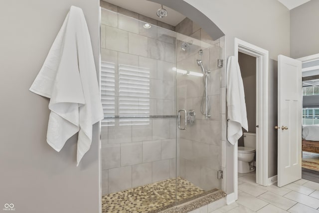 10795 Creekbed Cir, Fishers, IN 46038 - bathroom featuring a stall shower and tile patterned flooring