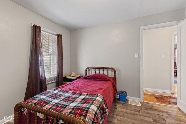2017 E Legrande Ave, Indianapolis, IN 46203 - bedroom with wood finished floors and baseboards