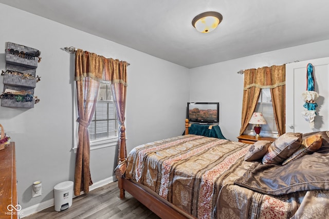 2017 E Legrande Ave, Indianapolis, IN 46203 - bedroom featuring wood finished floors and baseboards