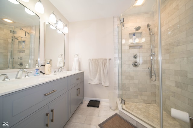 7224 N Tuxedo St, Indianapolis, IN 46240 - full bathroom featuring double vanity, a stall shower, and tile patterned floors