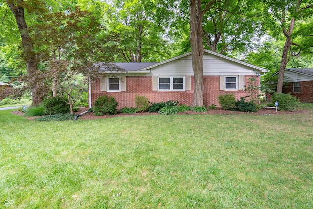 7224 N Tuxedo St, Indianapolis, IN 46240 - single story home featuring brick siding and a front yard