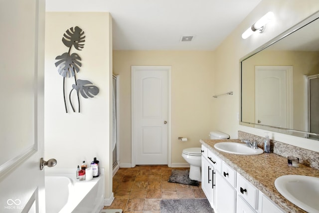 5664 Crump Ln, Indianapolis, IN 46234 - full bath with a stall shower, double vanity, a garden tub, and stone finish floors