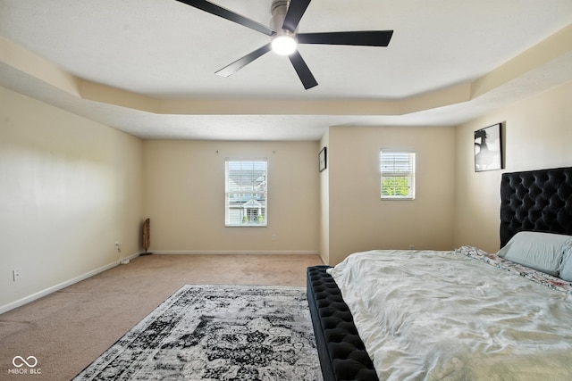 5664 Crump Ln, Indianapolis, IN 46234 - carpeted bedroom with baseboards and a tray ceiling