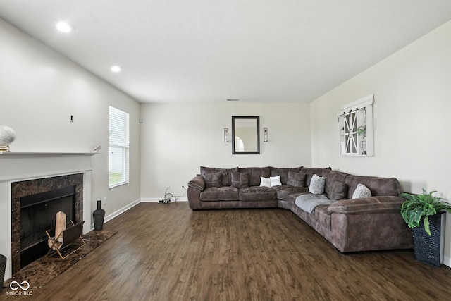 5664 Crump Ln, Indianapolis, IN 46234 - living room with dark wood-style floors, a fireplace, and recessed lighting