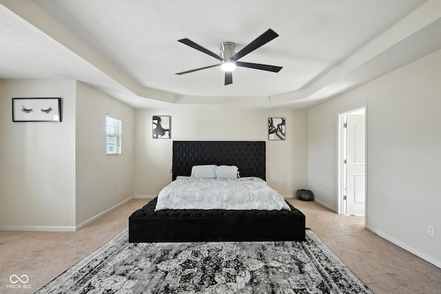 5664 Crump Ln, Indianapolis, IN 46234 - bedroom featuring light colored carpet, a raised ceiling, and ceiling fan