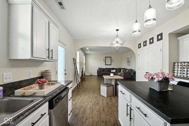 5664 Crump Ln, Indianapolis, IN 46234 - kitchen with arched walkways, dark countertops, and dishwasher