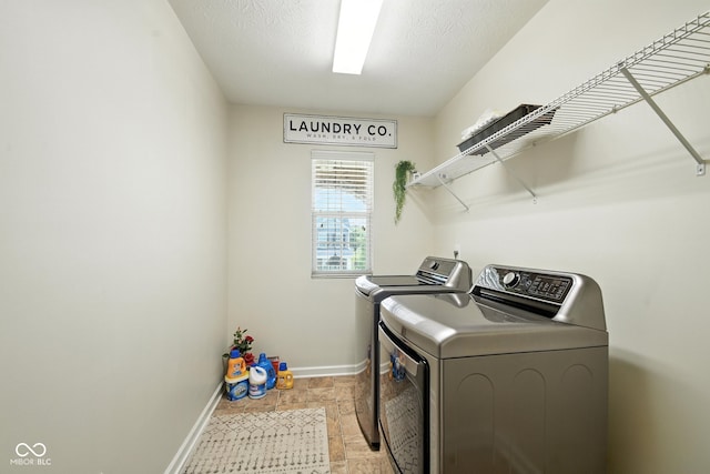 5664 Crump Ln, Indianapolis, IN 46234 - laundry room featuring washer and clothes dryer and baseboards