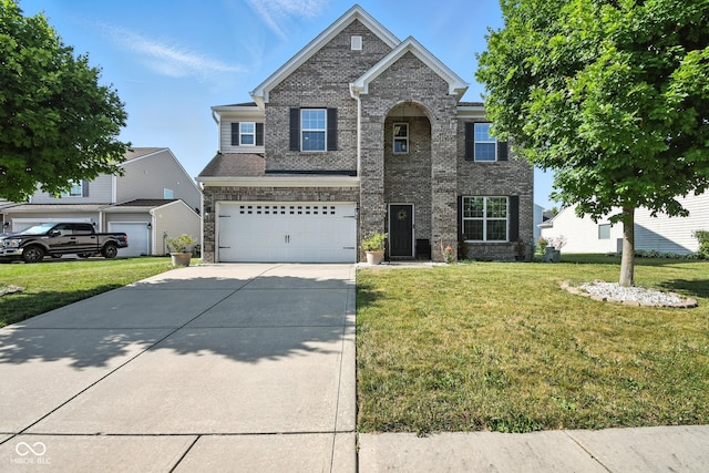 5664 Crump Ln, Indianapolis, IN 46234 - traditional-style house with concrete driveway, a front lawn, a garage, and brick siding