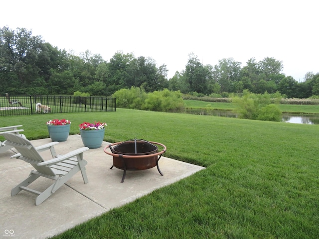 2272 Trefoil Dr, Plainfield, IN 46168 - view of yard featuring an outdoor fire pit, a patio, and a water view