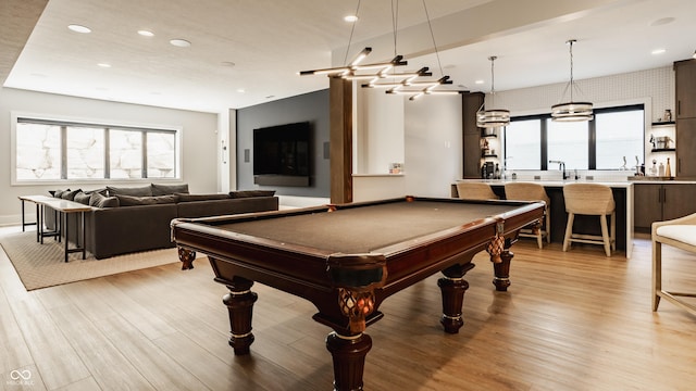 12022 Otto Ln, Carmel, IN 46032 - rec room with plenty of natural light, light wood finished floors, billiards, and recessed lighting
