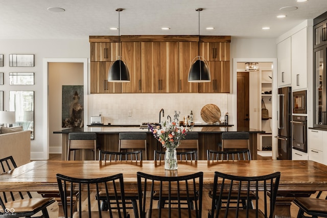 12022 Otto Ln, Carmel, IN 46032 - dining space featuring recessed lighting and baseboards
