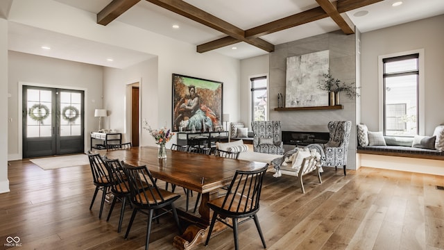 12022 Otto Ln, Carmel, IN 46032 - dining space featuring hardwood / wood-style flooring, beamed ceiling, recessed lighting, coffered ceiling, and french doors