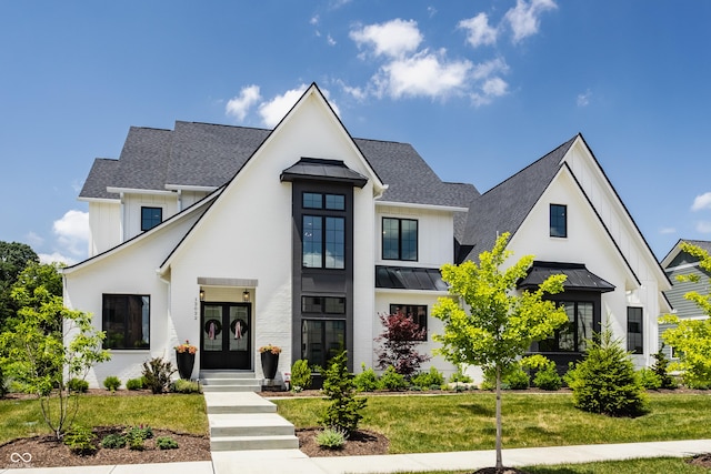 12022 Otto Ln, Carmel, IN 46032 - modern inspired farmhouse with board and batten siding, a standing seam roof, french doors, a front yard, and a shingled roof