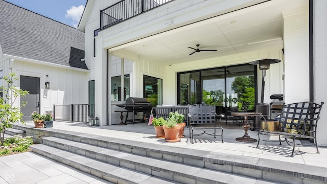 12022 Otto Ln, Carmel, IN 46032 - patio / terrace with a patio area, ceiling fan, area for grilling, and outdoor dining area