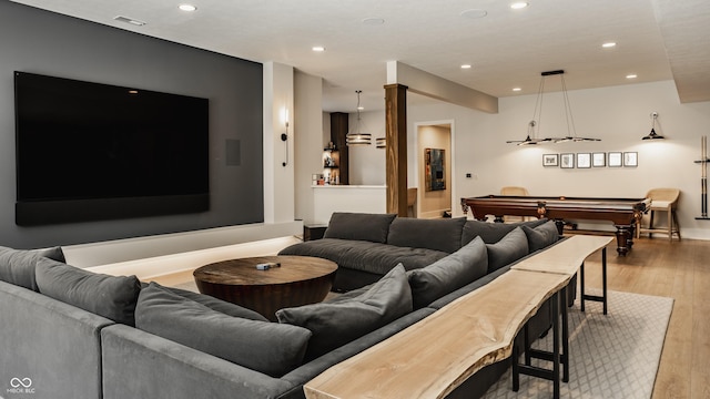 12022 Otto Ln, Carmel, IN 46032 - living room featuring light wood finished floors, recessed lighting, and billiards