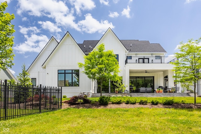 12022 Otto Ln, Carmel, IN 46032 - back of property with a balcony, board and batten siding, and ceiling fan