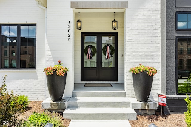 12022 Otto Ln, Carmel, IN 46032 - property entrance featuring french doors and brick siding