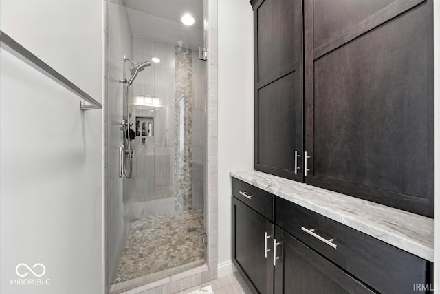 4909 N Graystone Dr, Muncie, IN 47304 - full bath featuring a stall shower and baseboards
