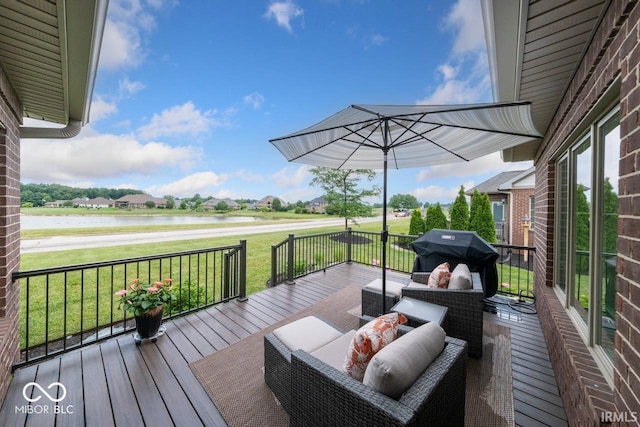 4909 N Graystone Dr, Muncie, IN 47304 - wooden terrace featuring a water view, area for grilling, and a lawn
