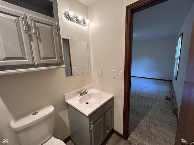 4675 N Riverside Dr, Columbus, IN 47203 - bathroom with vanity and toilet